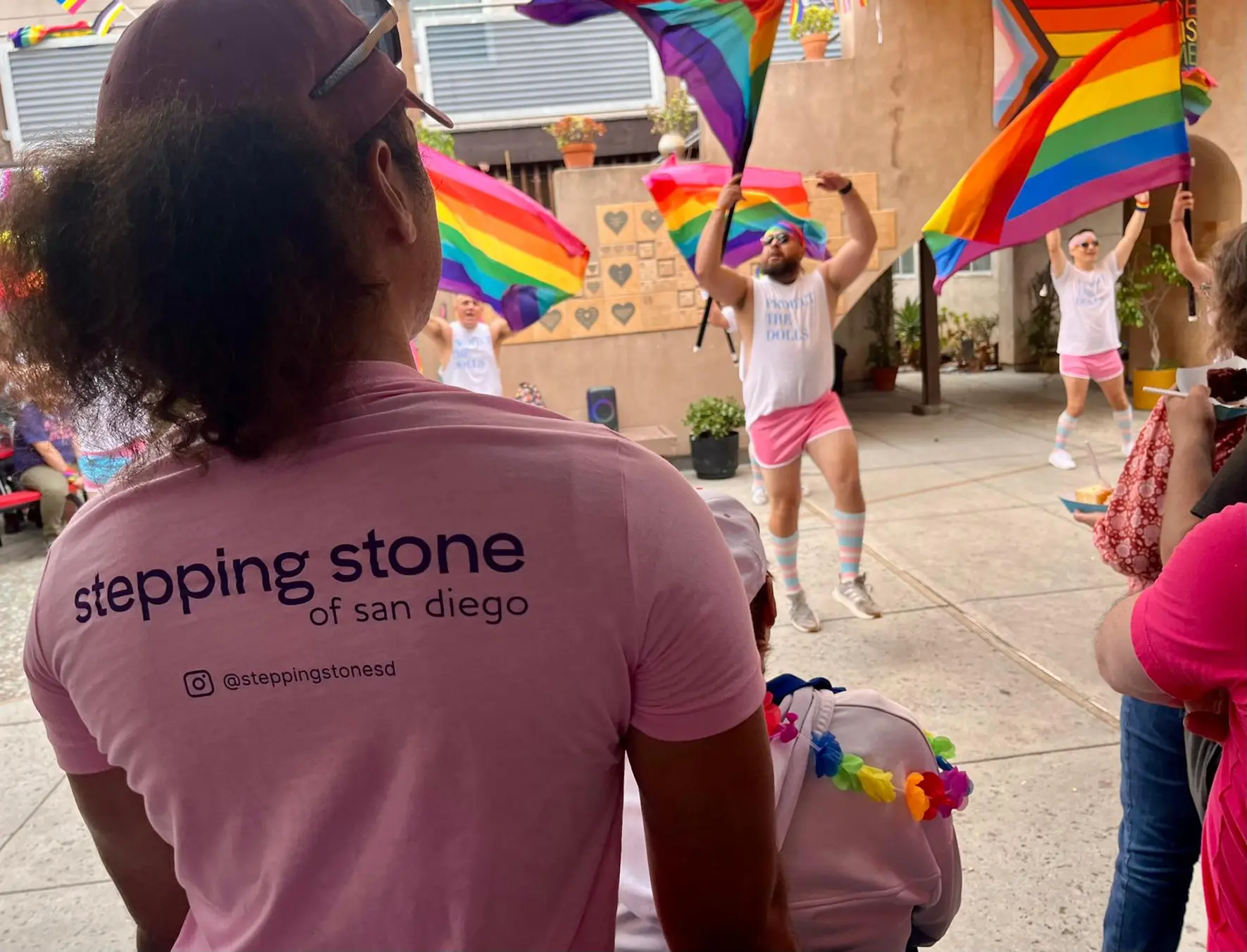 Stepping Stone team behind their banner at the San Diego Pride parade